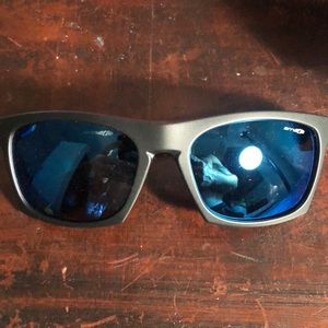 Arnette brand new, w/case & adjust. Blue temples